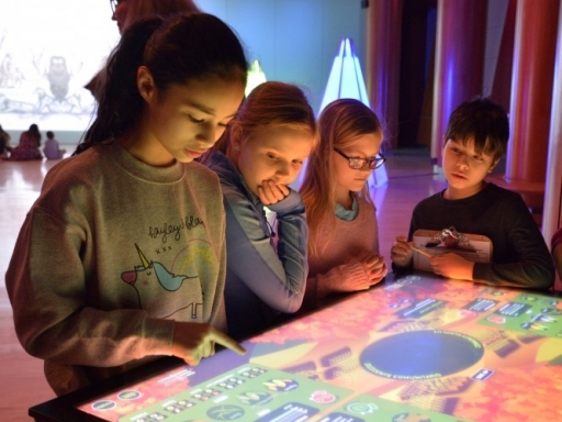 kids using interactive table.